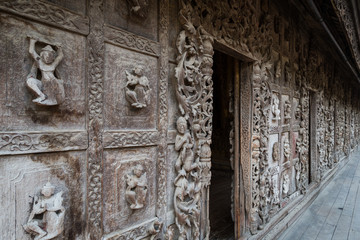 Close-up of wood carvings at the wooden Shwenandaw Monastery (also known as Golden 
Palace Monastery) in Mandalay, Myanmar (Burma).