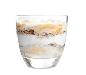 Tasty dessert with yogurt and granola in glass on white background