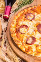 Pizza pepperoni sausage with tomato sauce, an oregano and cheese