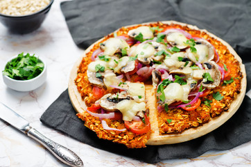 Sweet potato pizza crust with tomato, red onion and mushrooms