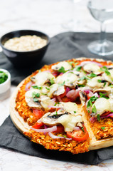 Sweet potato pizza crust with tomato, red onion and mushrooms