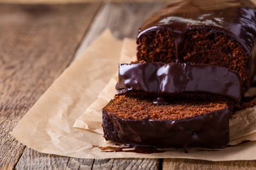 Homemade chocolate cake on wooden table