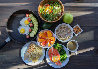 Health & Fitness Food in lunch boxes. Set meal for the whole day.