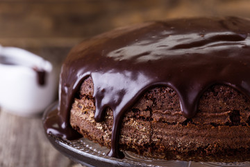 Homemade chocolate cake on glass cakestand