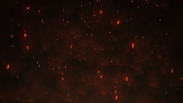 Firestorm texture. Bokeh lights on black background, shot of flying fire sparks in the air