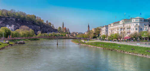 Salzburg, Austria.Panoramic view of Salzburg with Salzach river during sunny spring day  