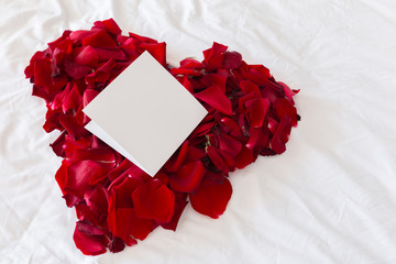Beautiful heart of red rose petals