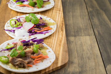 Pork verde tacos. Copy space.