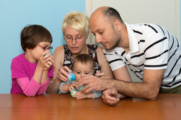 Naklejka premium Family having breakfast on Easter day