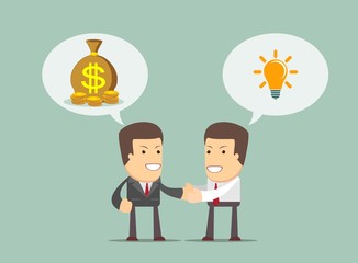 Two businessmen shaking hands to seal an agreement