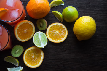 Fototapeta na wymiar Fresh juice with fruits on table