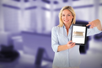 Composite image of mature student showing tablet pc