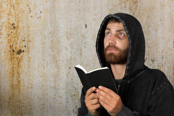 Man Holds Bible