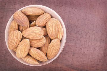 Almonds in the bowl (Prunus dulcis)