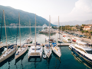 Fototapeta na wymiar Sailboat near the old town of Kotor, Bay of Kotor, Montenegro