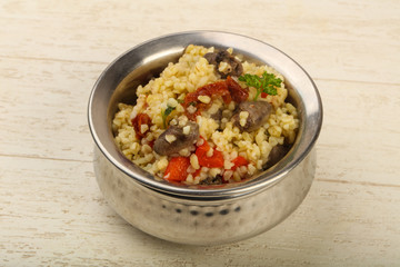 Bulgur with chicken hearts