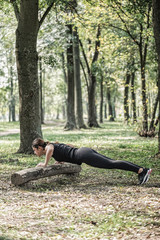 Doing push-ups in park