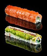 Dragon rolls over black background