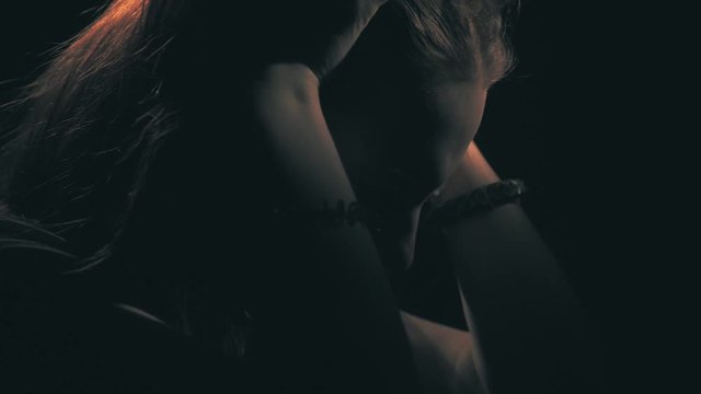 Unhappy sad teen girl. Domestic violence and abuse concept. 60 to 24fps UHD