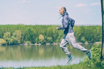 Man running jogging in nature