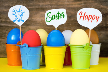 Bright  dyed eggs in colored buckets with speech bubbles. Happy Easter Card  