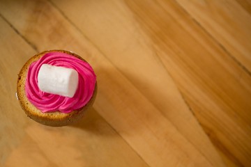 Dessert served on wooden table in coffee shop
