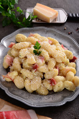 Gnocchi with prosciutto ham and cheese sauce