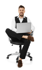 Handsome young man with laptop on white background