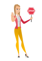 Caucasian business woman holding stop road sign.
