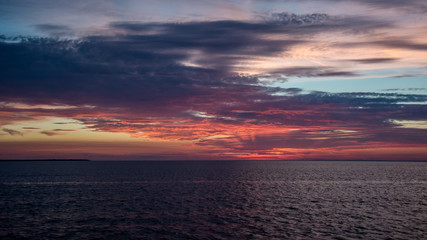 sunset on lake with colorful sky