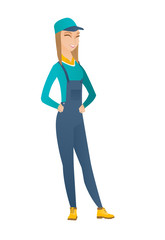 Young caucasian mechanic laughing.