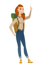 African traveler pointing with her forefinger.