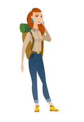 Traveler woman talking on a mobile phone.