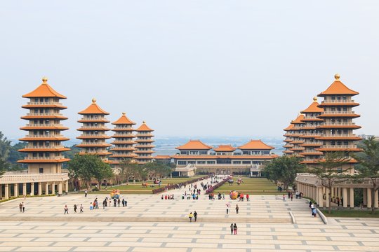 Kaohsiung, Taiwan. Fo Guang Shan buddist temple of Kaohsiung with many tourists walking by.