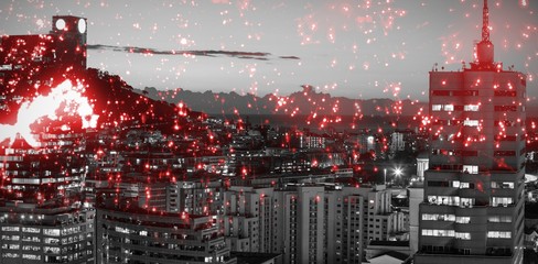 Composite image of white fireworks exploding on black background