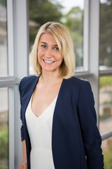 Beautiful businesswoman standing in conference centre