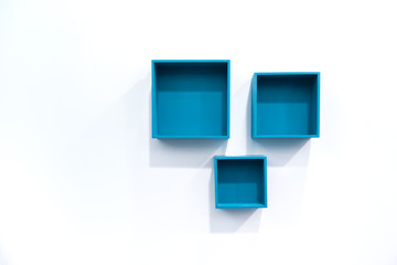 Blue Boxes Shelve on Wall