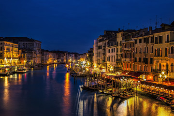 Looking out from Venice's Rialto Bridge at twilight