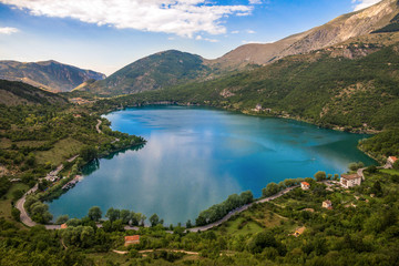 Naklejka na ściany i meble Lake Scanno (L'Aquila, Italy) - When nature is romantic: the heart-shaped lake on the Apennines mountains, in Abruzzo region, central Italy
