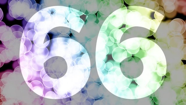 Sixty six to sixty seven years birthday fade in/out animation with color gradient moving bokeh background. Animation: 90 frames still with number, 180 fade out, 30 clear, 180 fade in, 300 still.
