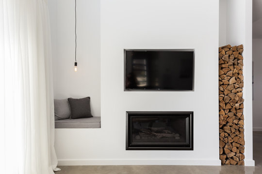 Built in tv and gas fire in a contemporary living room