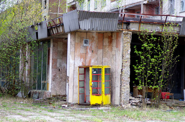 Fototapeta na wymiar Old phonebooth in Pripyat city