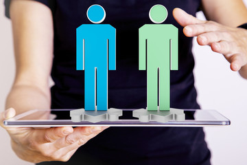 Person with tablet pc and figures