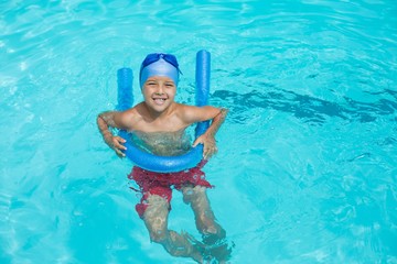 High angle view of boy swimming in pool