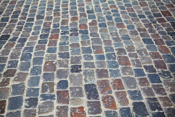 Fototapeta premium Old cobblestone street, background or texture