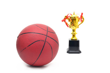 Golden trophy cup with a Basketball ball.