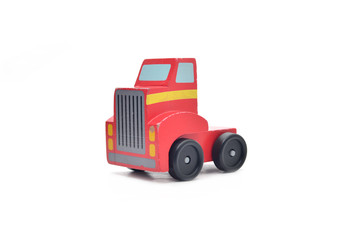 Wooden toy truck on a white background.