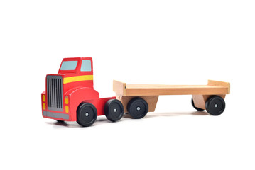 Wooden toy truck on a white background.