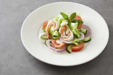 Salad of vegetables and boiled shrimp