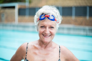 Fototapeta premium Portrait of cheerful senior swimmer